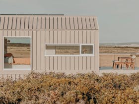 Side view of property with deck