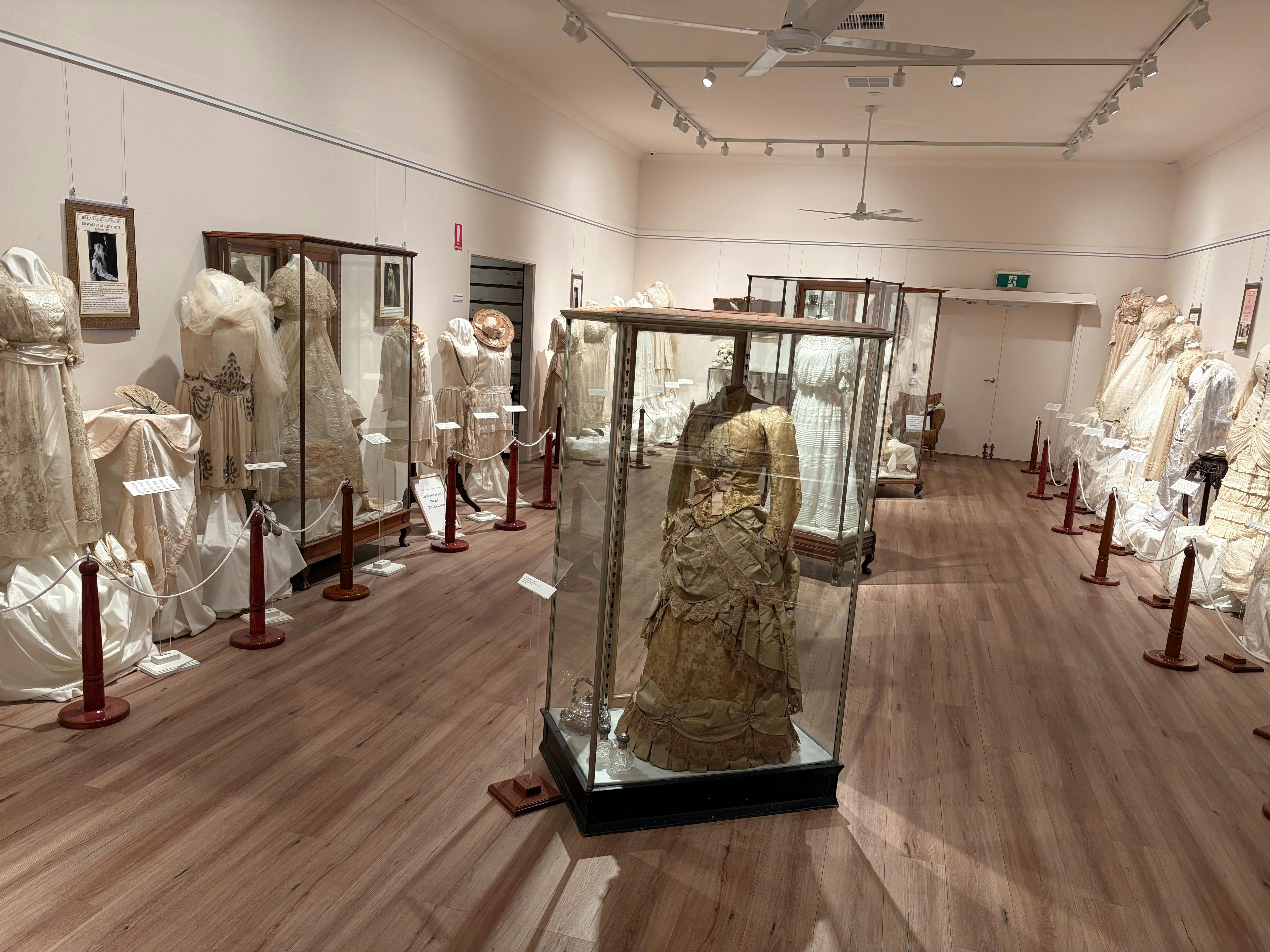 Variety of dresses inside the Costume and Kelly Museum