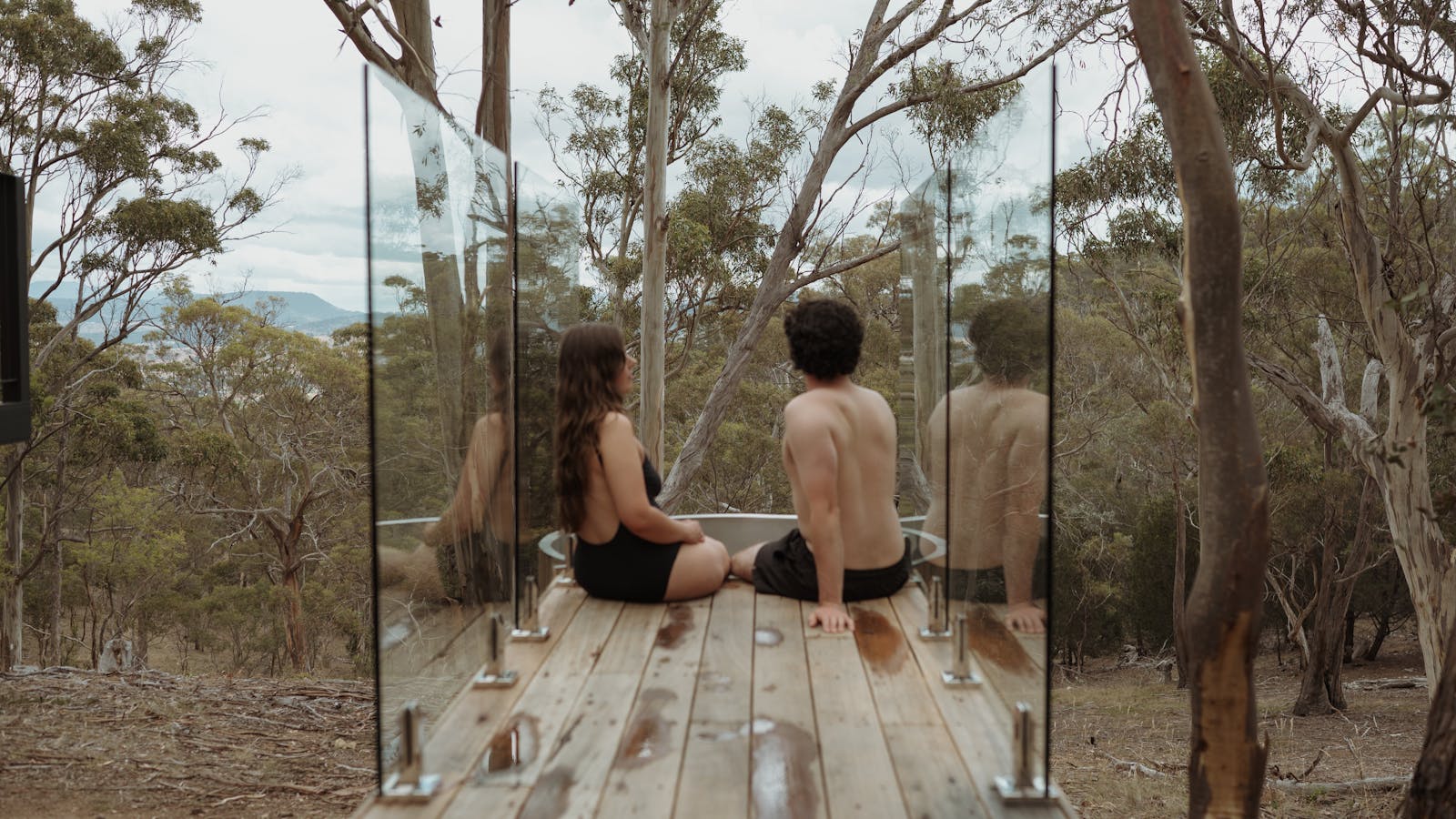 Relax in the hottub with a view across the tree tops