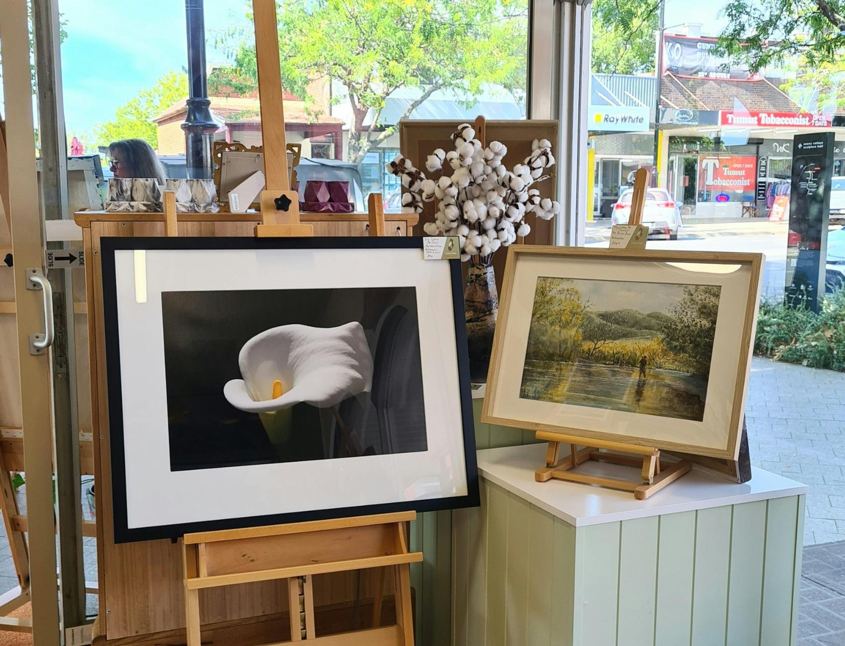 Photo of a lily and watercolour of a river