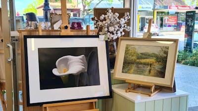 Photo of a lily and watercolour of a river