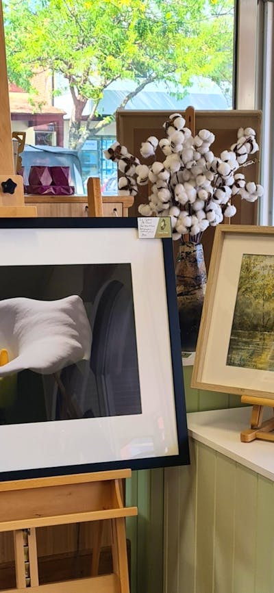 Photo of a lily and watercolour of a river