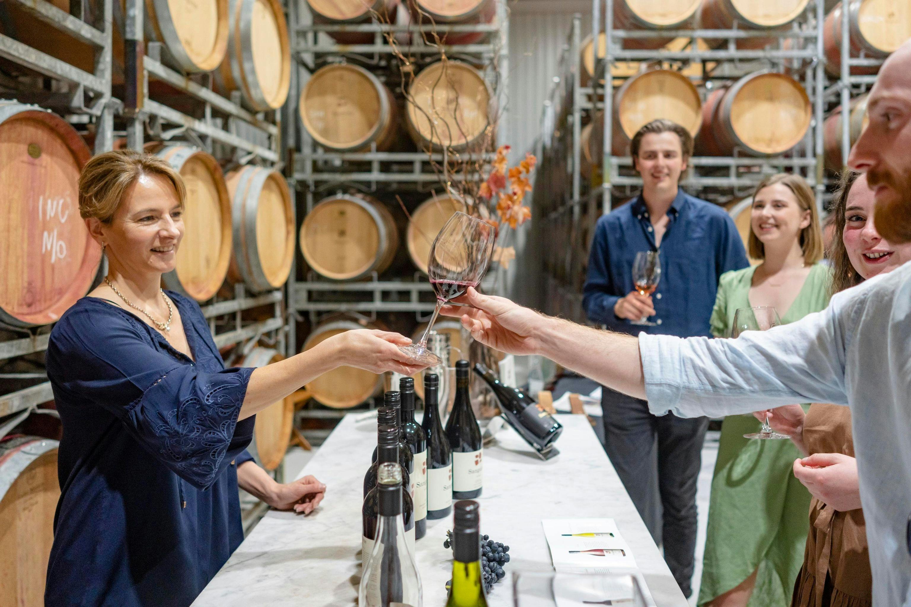 Rambling tour group tasting in the barrel room at Sanguine Wines (Heathcote)