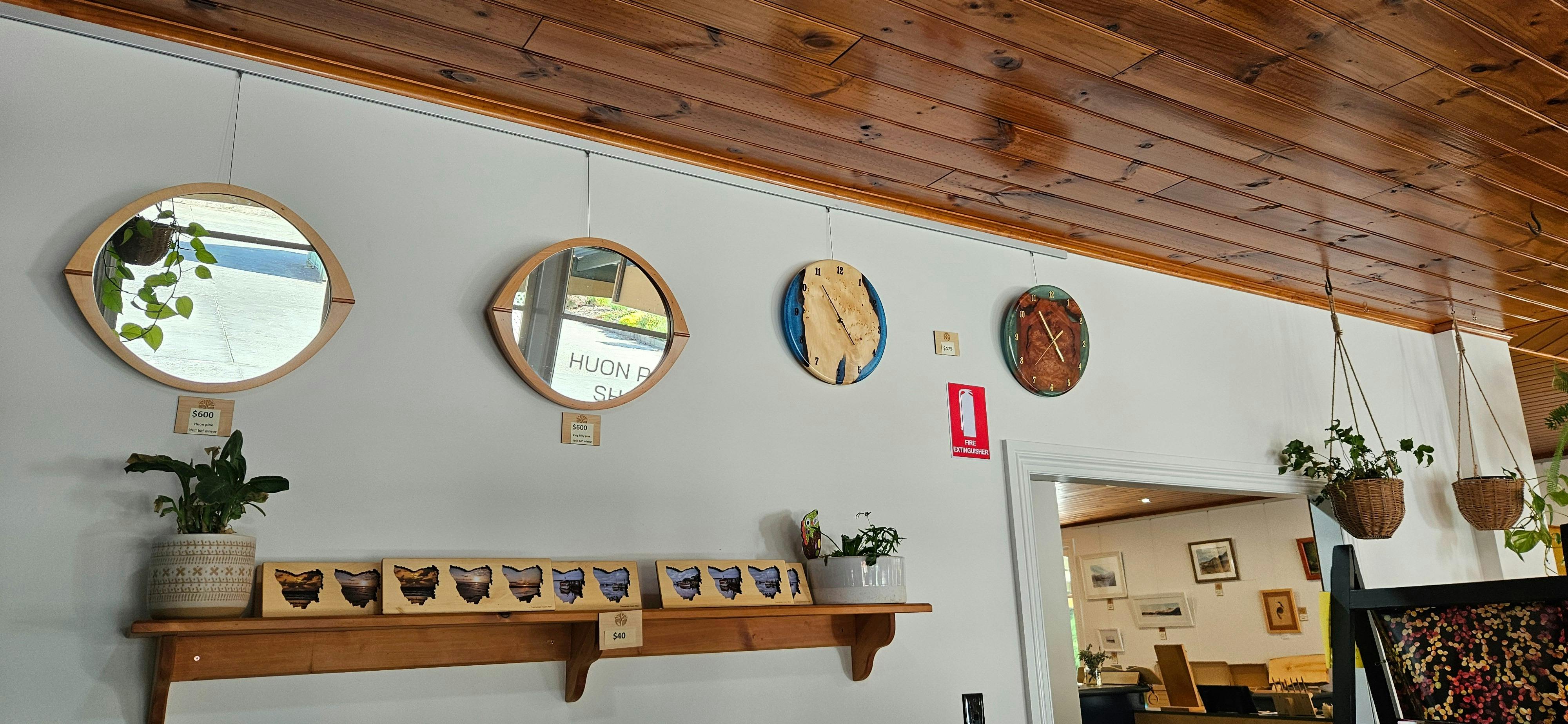 Mirrors, clocks hanging on a wall