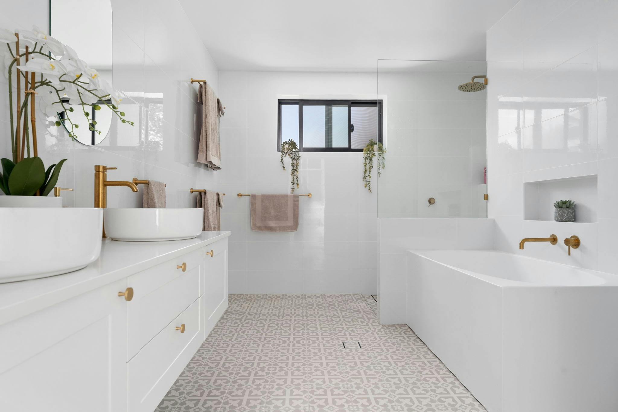 Bathroom with 2 sinks, bath and shower