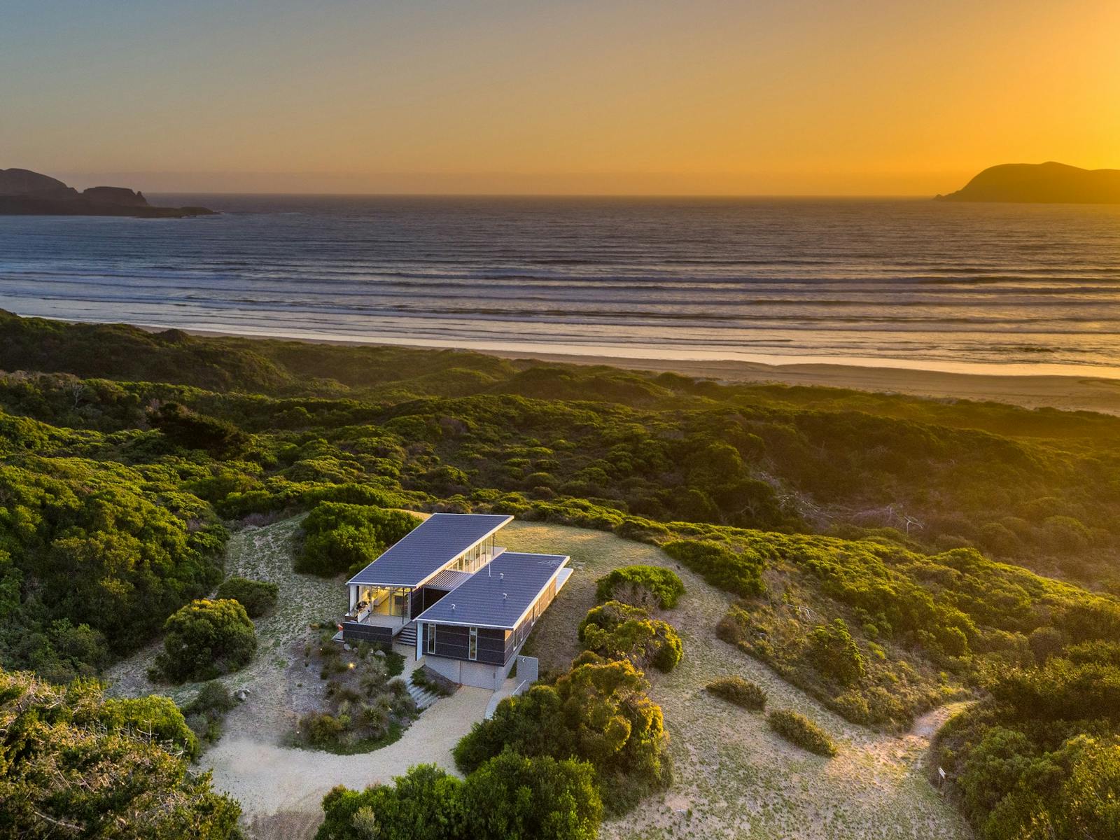 Cloudy Bay Beach House - Aerial view with East/West Heads