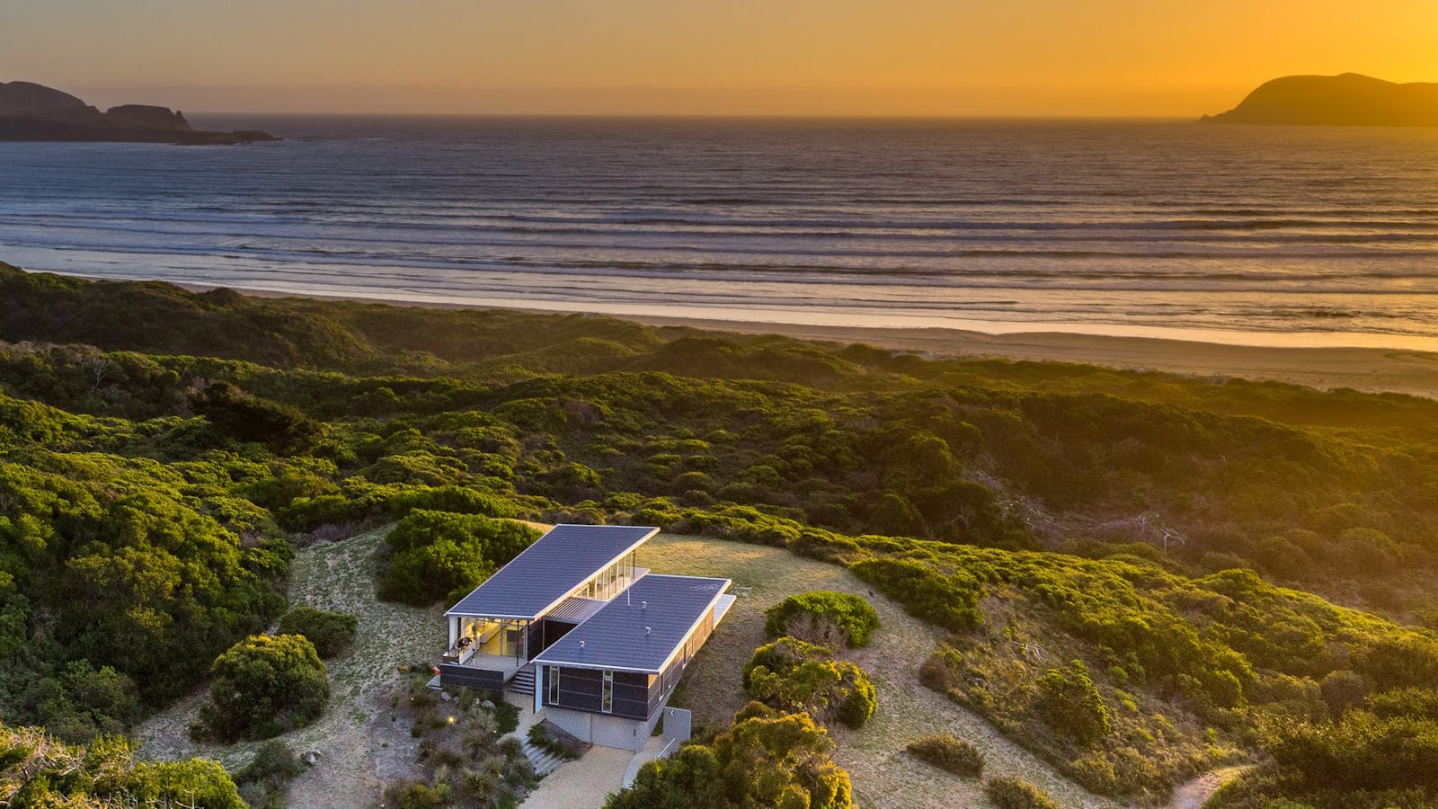 Cloudy Bay Beach House - Aerial view with East/West Heads