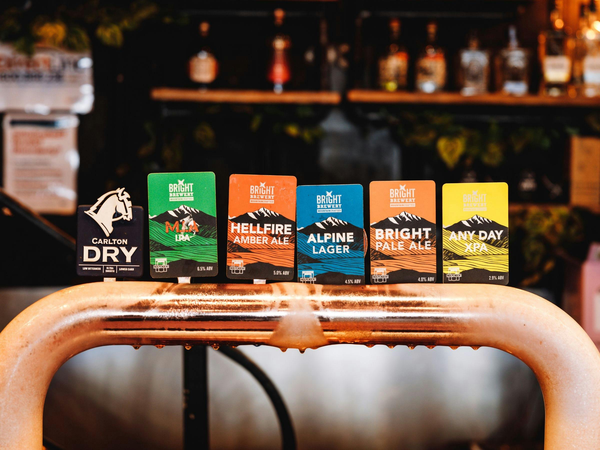 An image of a variety of beers available on tap at Frying Pan Inn