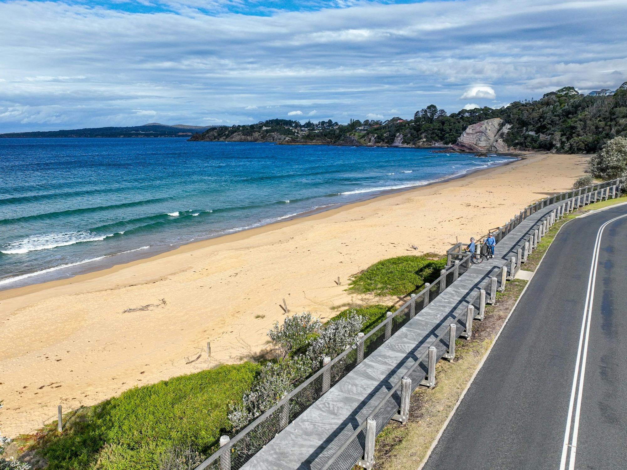 Cycling along Aslings Beach Eden