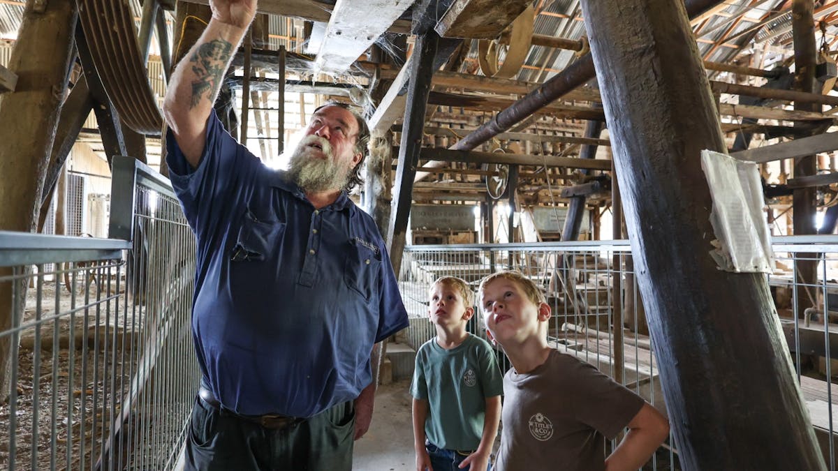 Our guide showing a couple of children the inside of the Venus Gold Battery