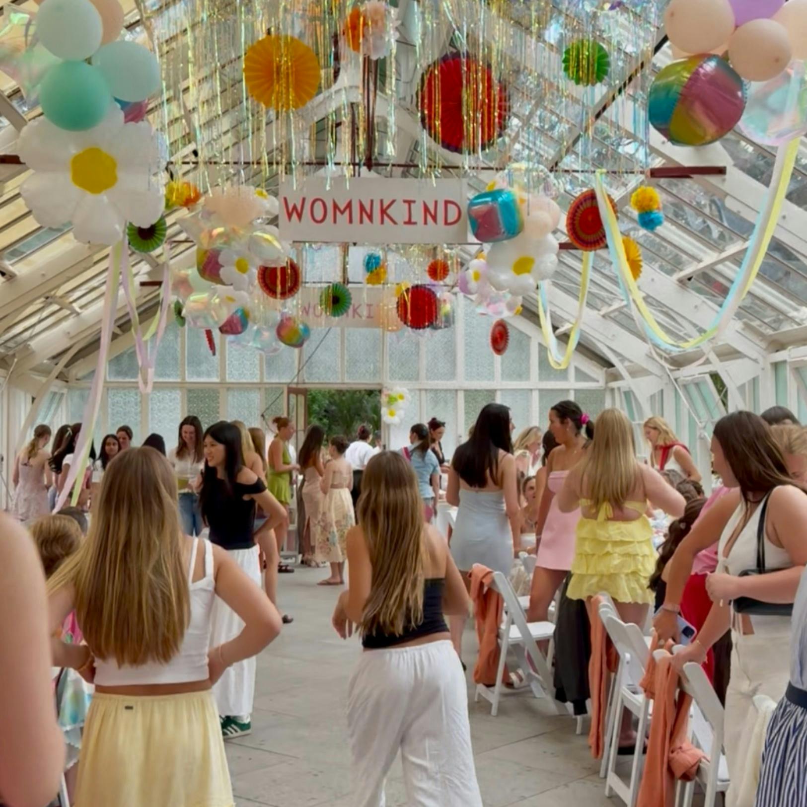 Vibrant and happy attendee atmosphere of a past Womn-Kind event in Sydney