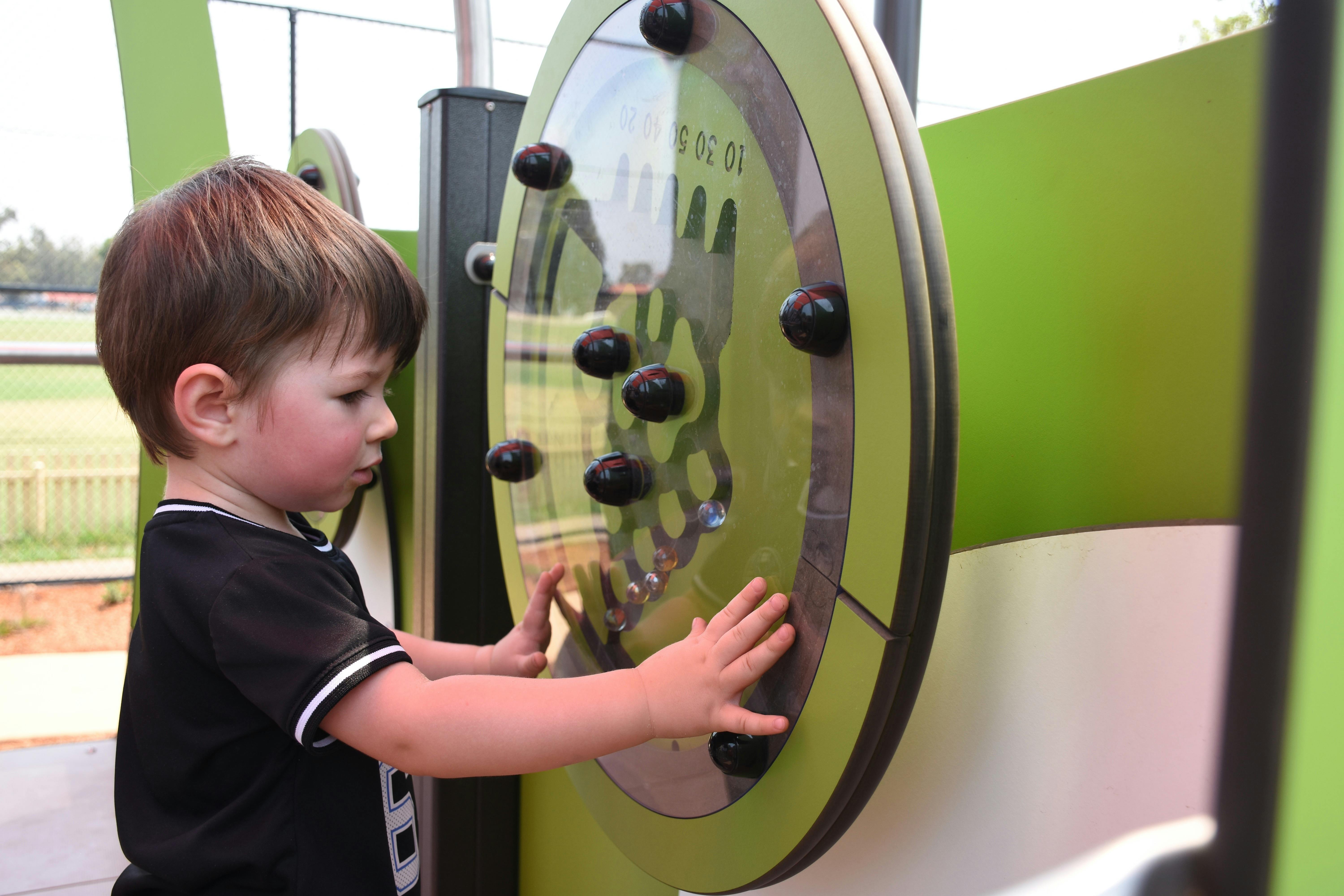 Boy at sensory wheel