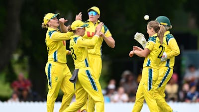 The Australian Women's Cricket Team celebrates a wicket in a One-Day International Match