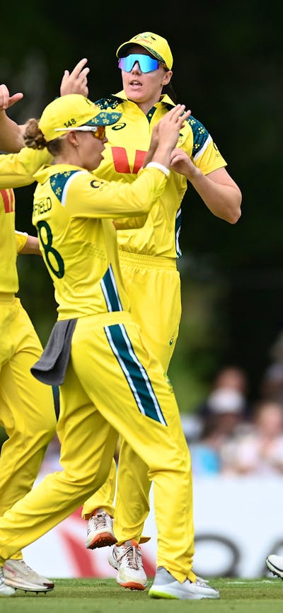 The Australian Women's Cricket Team celebrates a wicket in a One-Day International Match