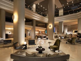 Hilton Darwin luxury lobby area in Darwin city, mood lighting warm modern lobby