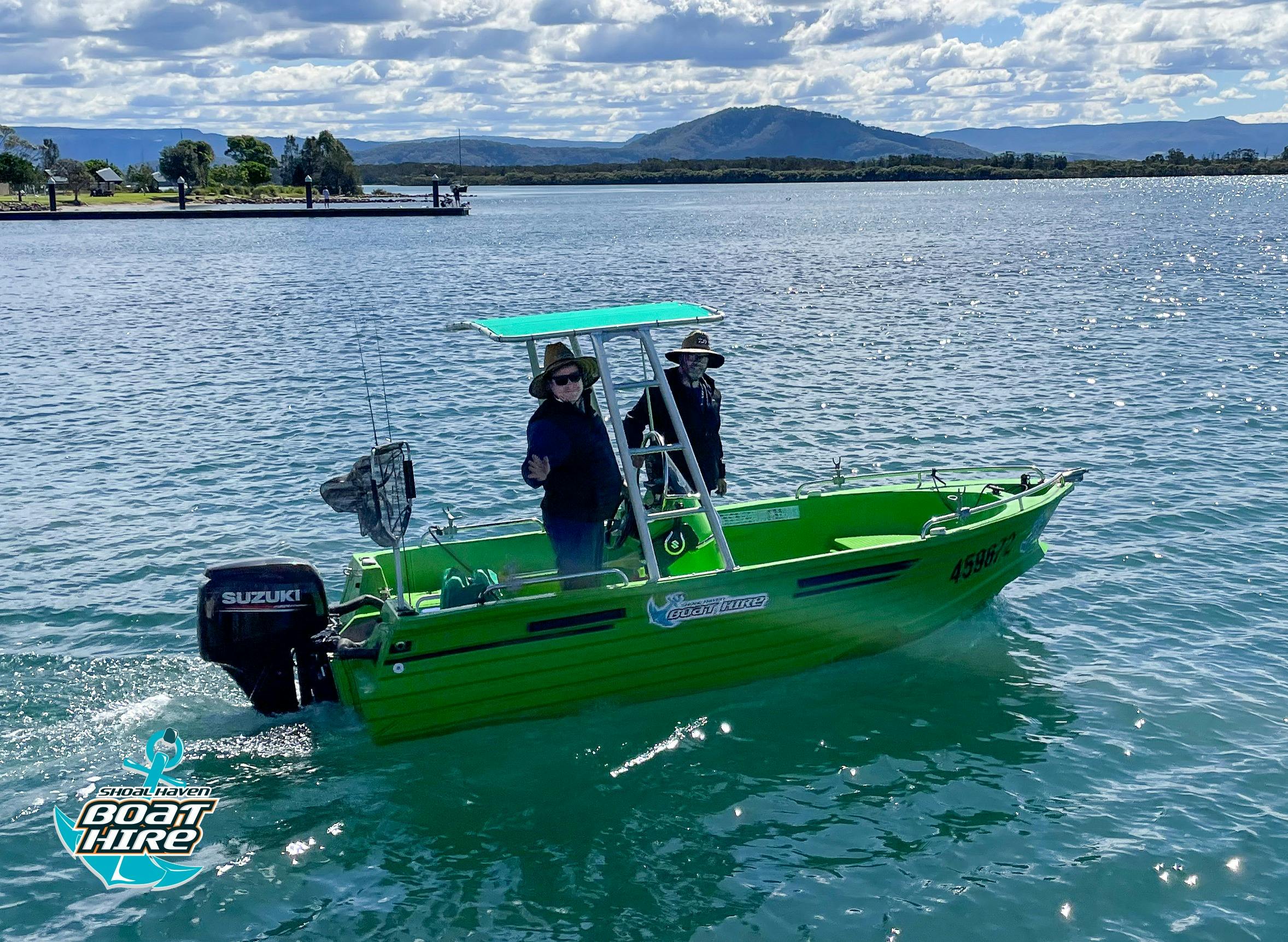 Green polycraft 60hp on water.