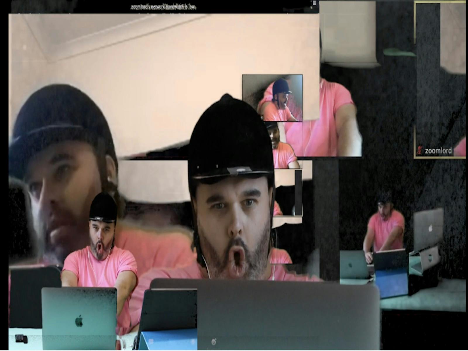 A fragmented digital collage of a man in a pink shirt and black cap using multiple laptops