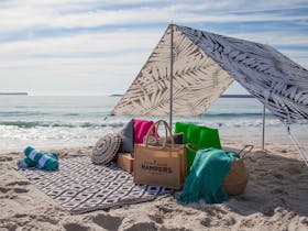 Picnic hamper on the beach Picnic hamper on the beach