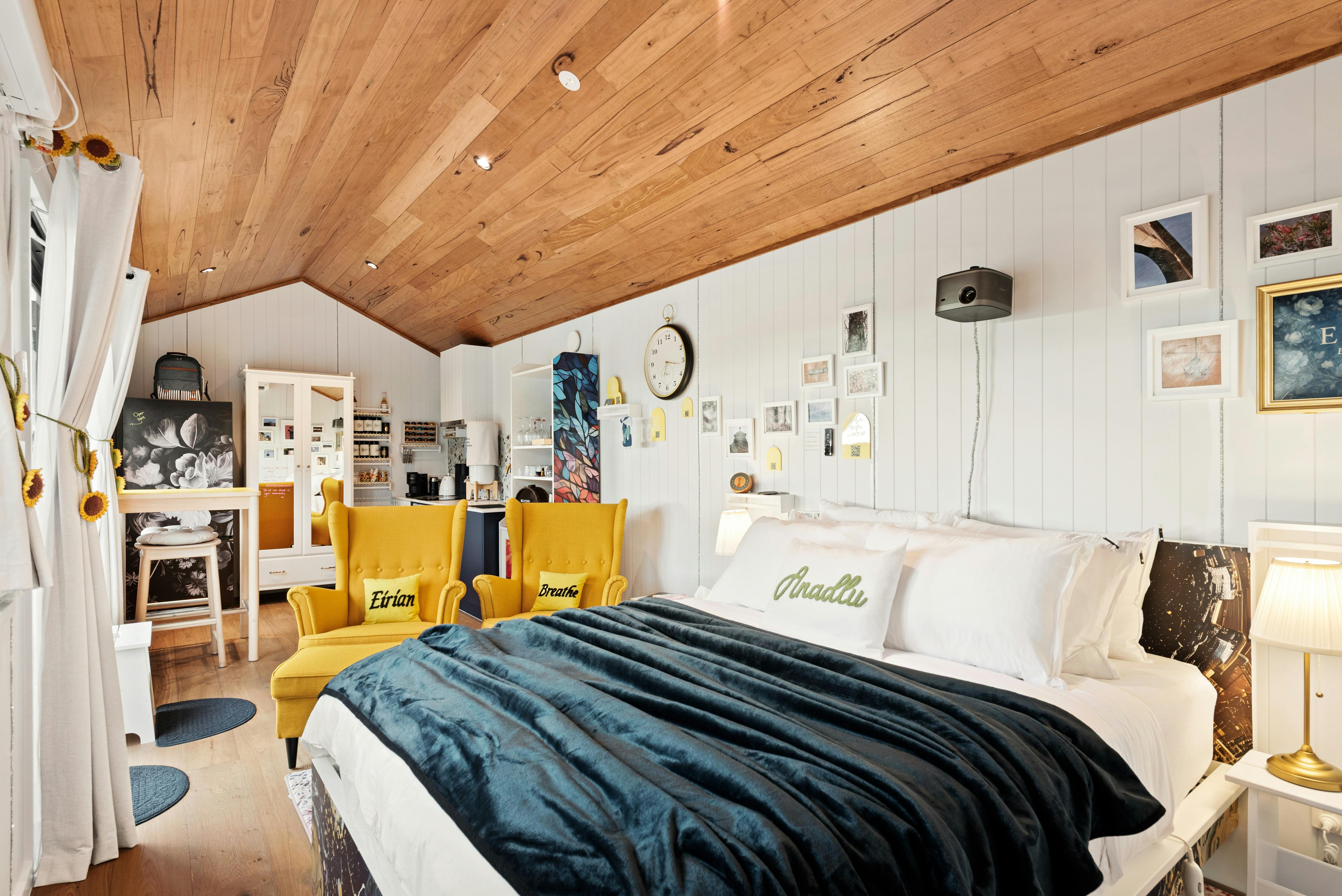 Interior of Eirian showing bed, seating, dining and kitchen