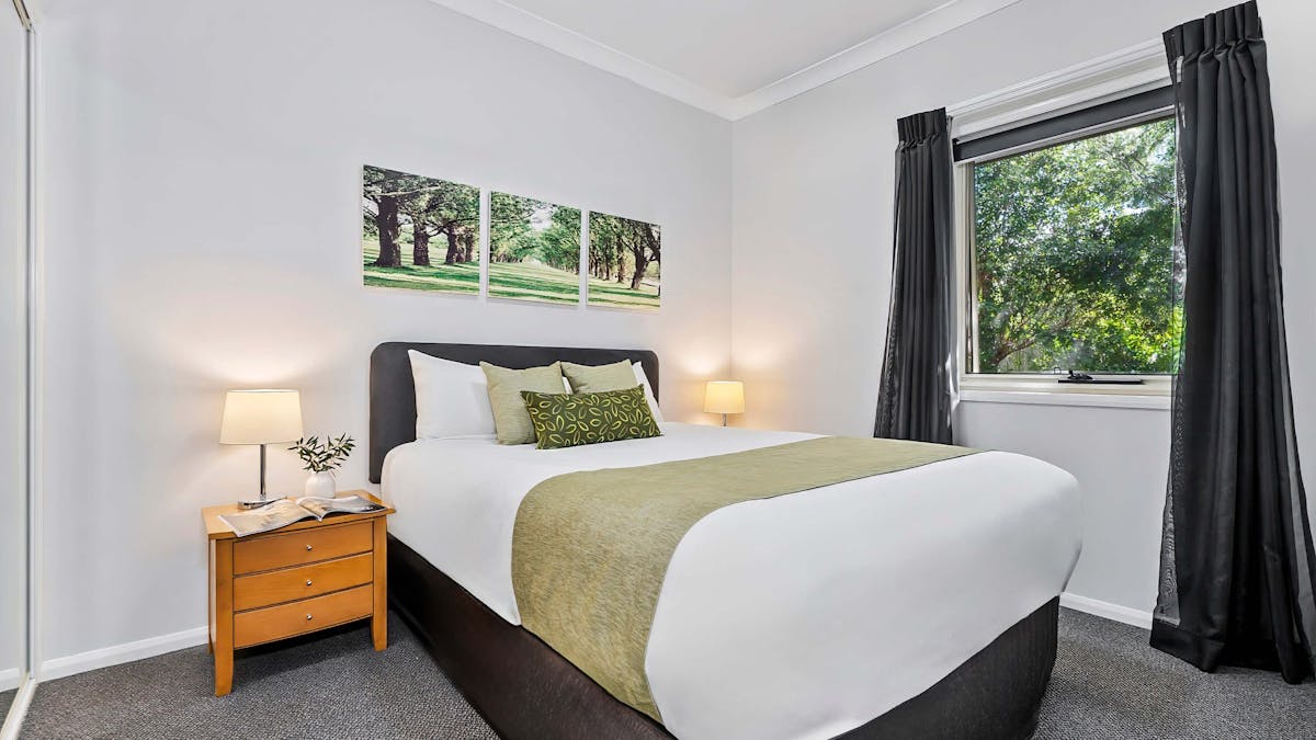 A clean, spacious and modern bedroom at the Emerald Inn.