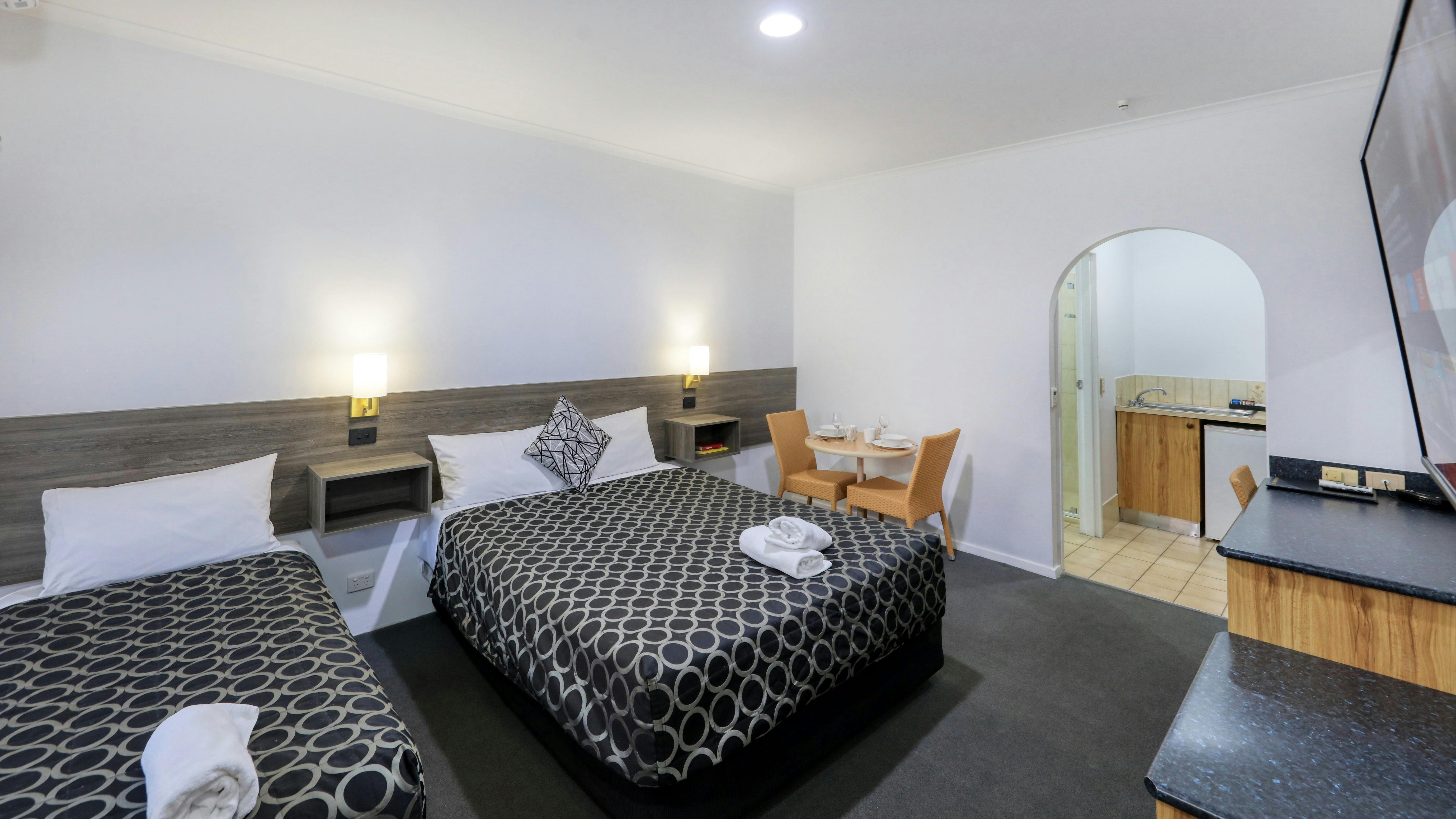 One Queen bed and one single bed