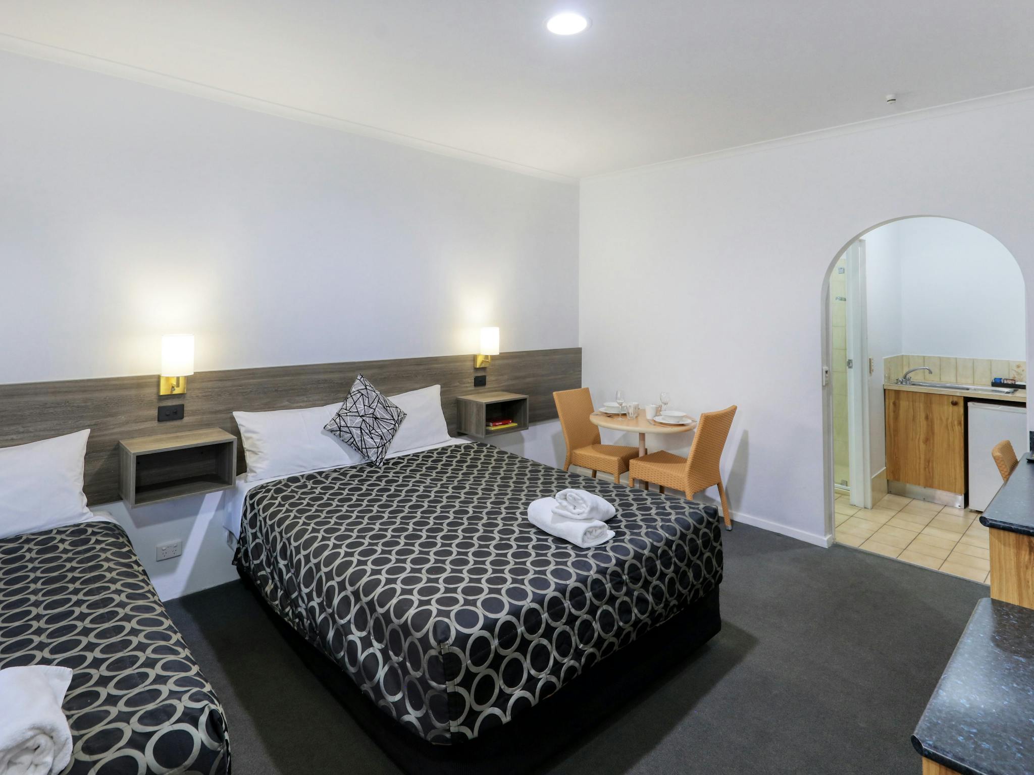 One Queen bed and one single bed