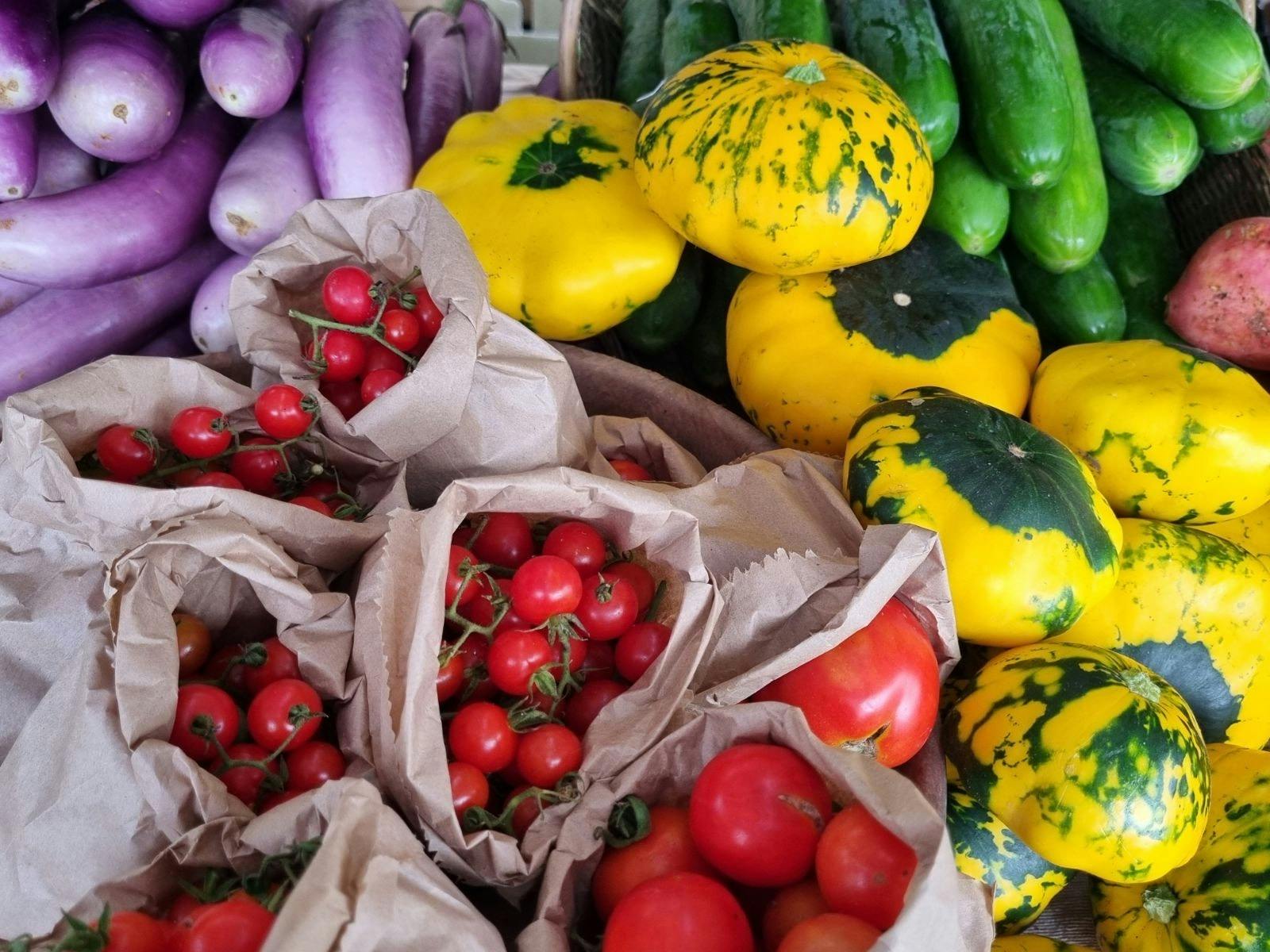 Selection of organic produce on market table