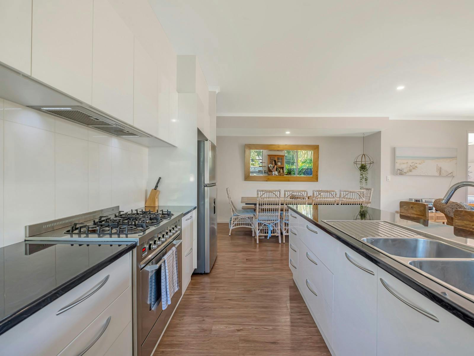Fully equipped kitchen with island bench and butler's pantry