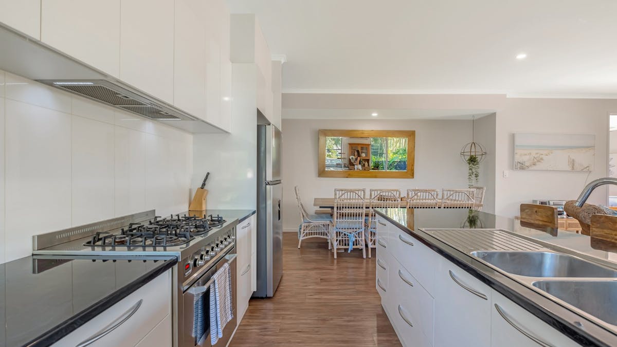 Fully equipped kitchen with island bench and butler's pantry Fully equipped kitchen with island bench and butler's pantry