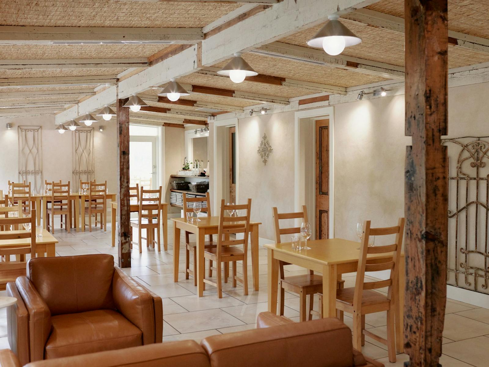 Image of Vigna Bottin Tasting Room with couch, table and chairs