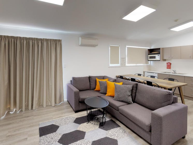 Jindabyne's living room in the two bedroom apartment