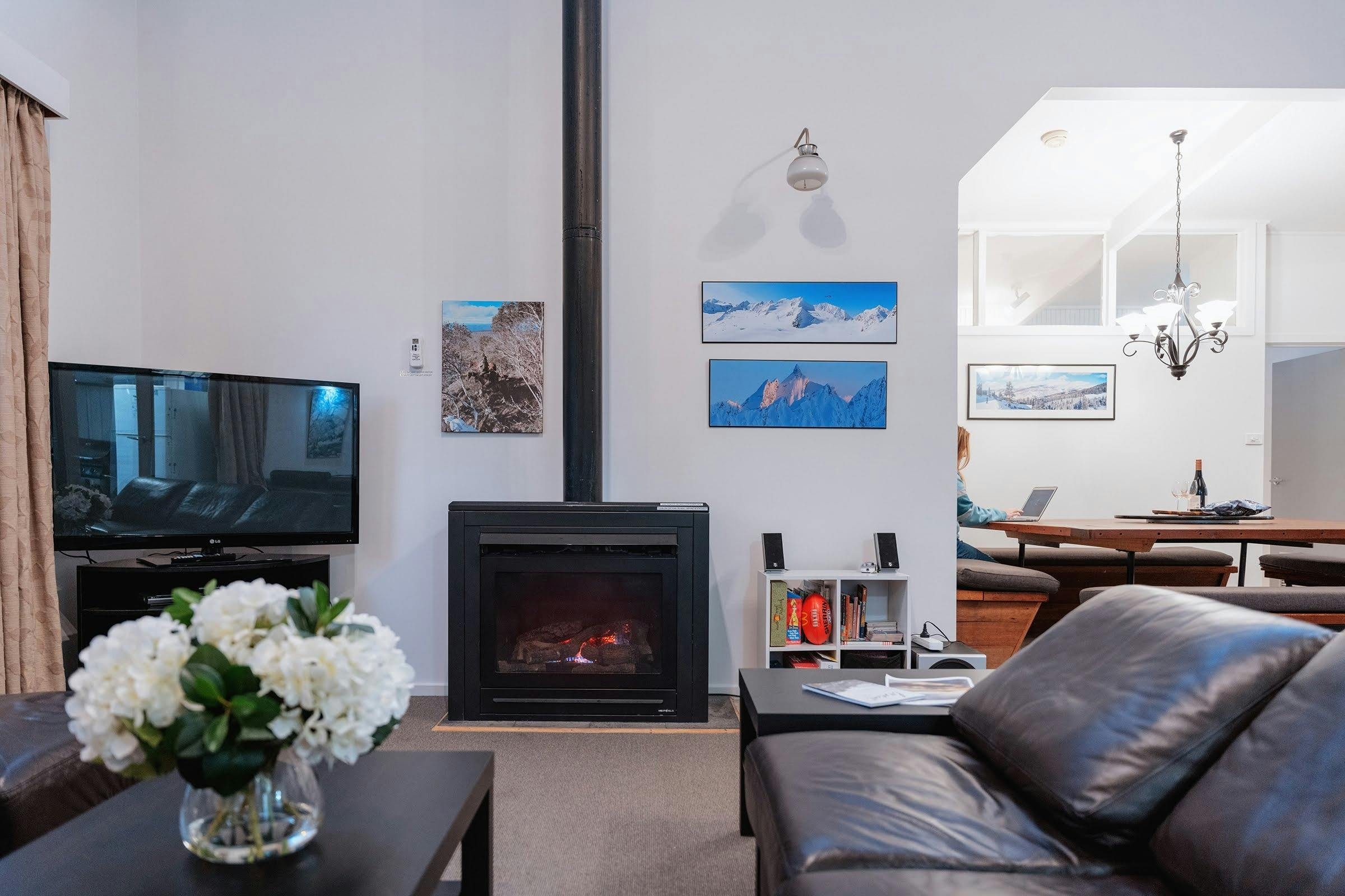 Cosy fireplace lounge at Cawarra Mt Buller