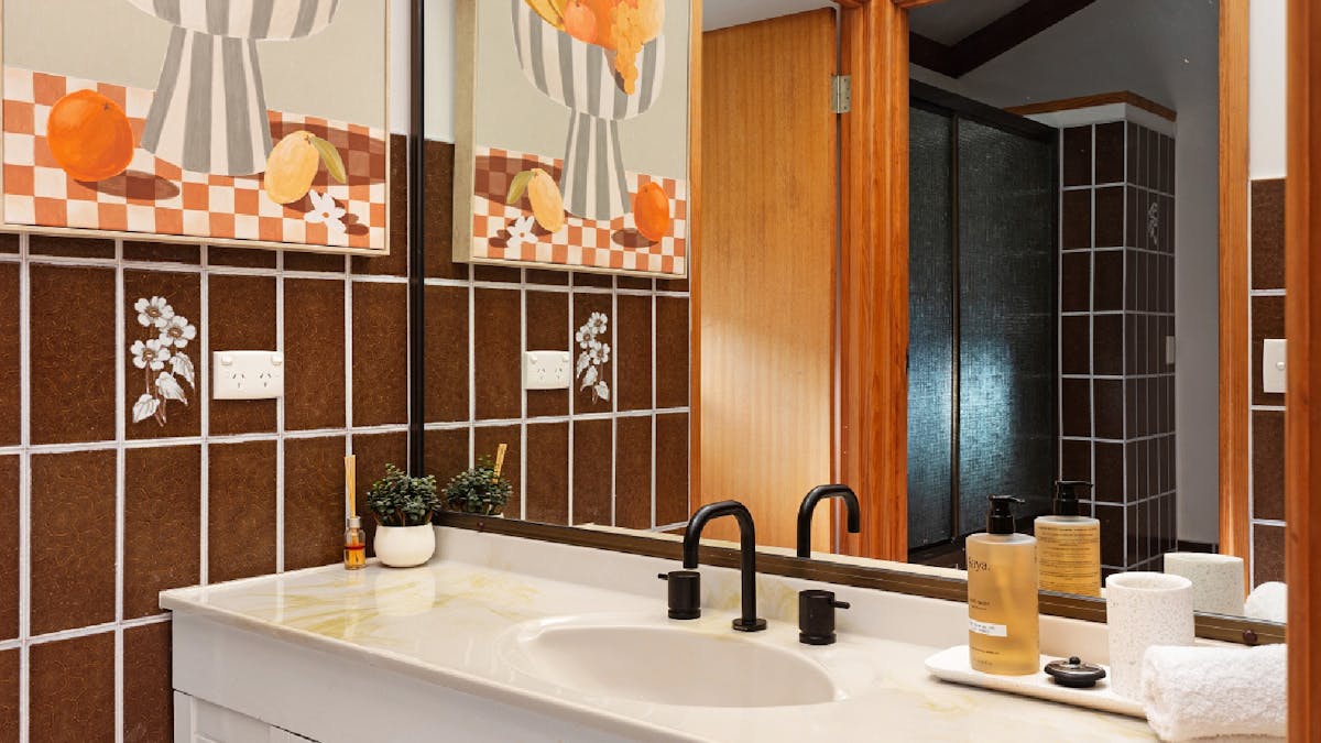 Shared bathroom with bath
