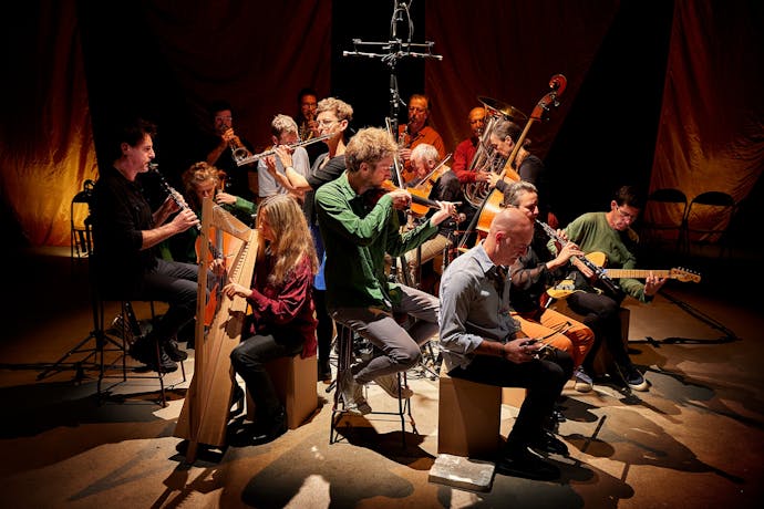 twelve musicians playing instruments