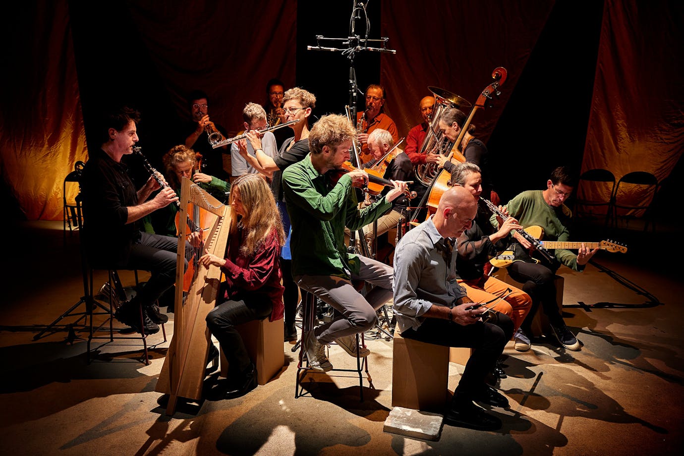 twelve musicians playing instruments