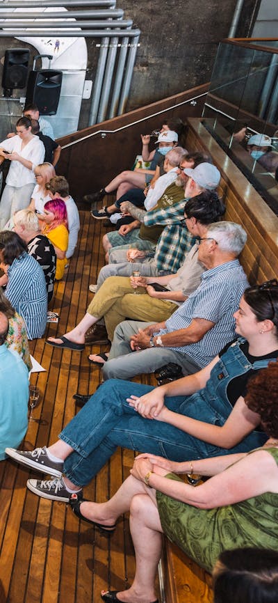 Visitors watching glass blowing