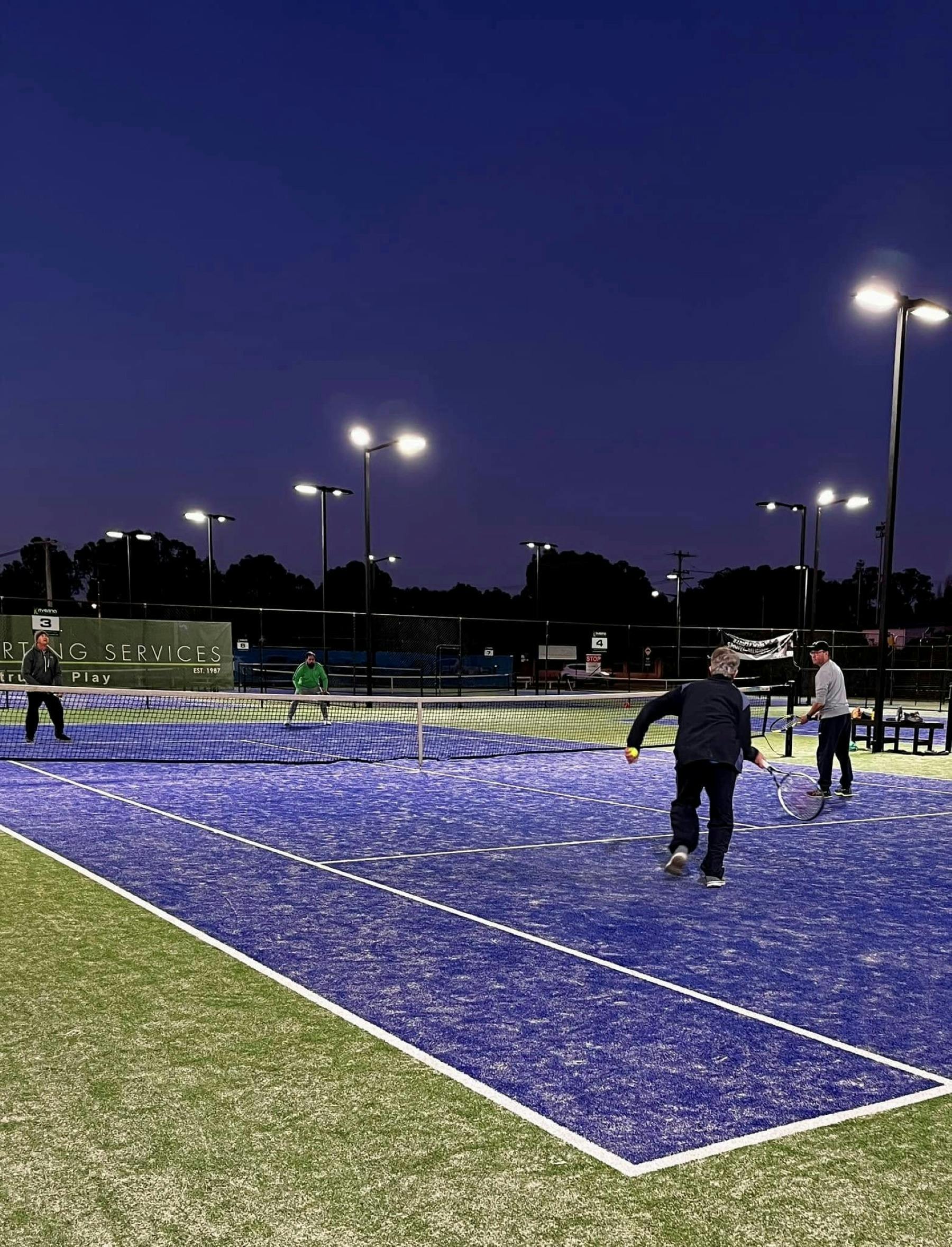 Nighttime tennis at the club