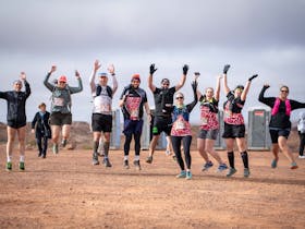 group of people jumping for joy