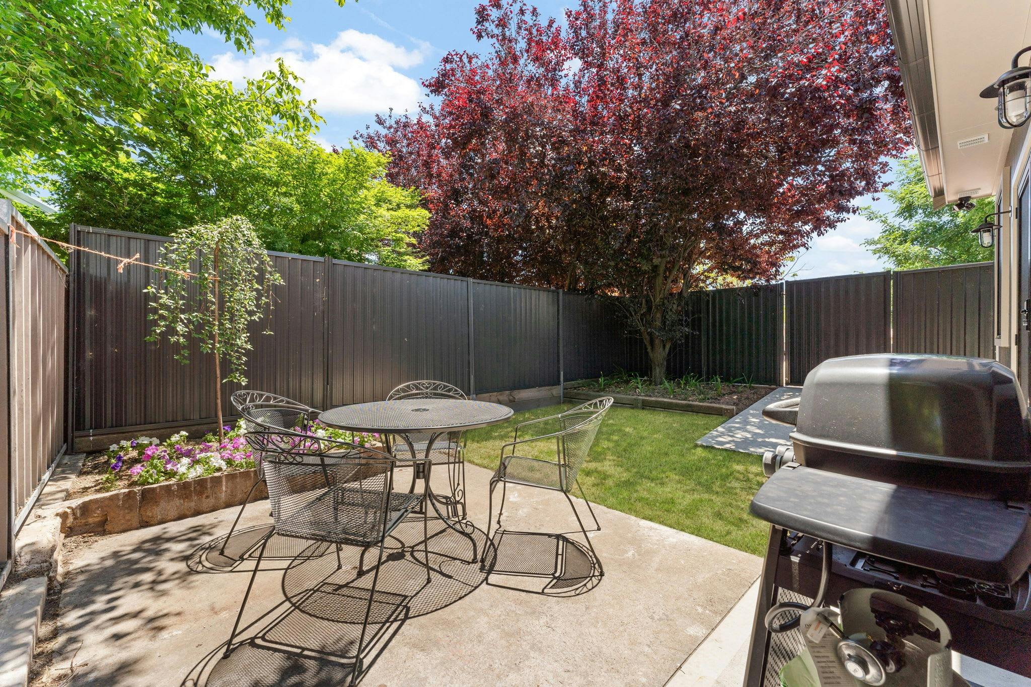 Outdoor dining table and chairs with bbq