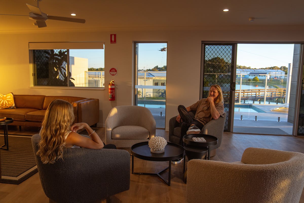 Shared lounge area over looking the pool  Mackay Adventure Lodge