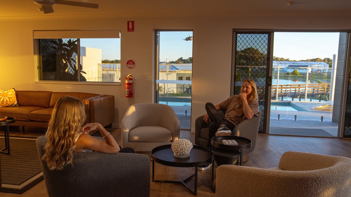 Shared lounge area over looking the pool  Mackay Adventure Lodge