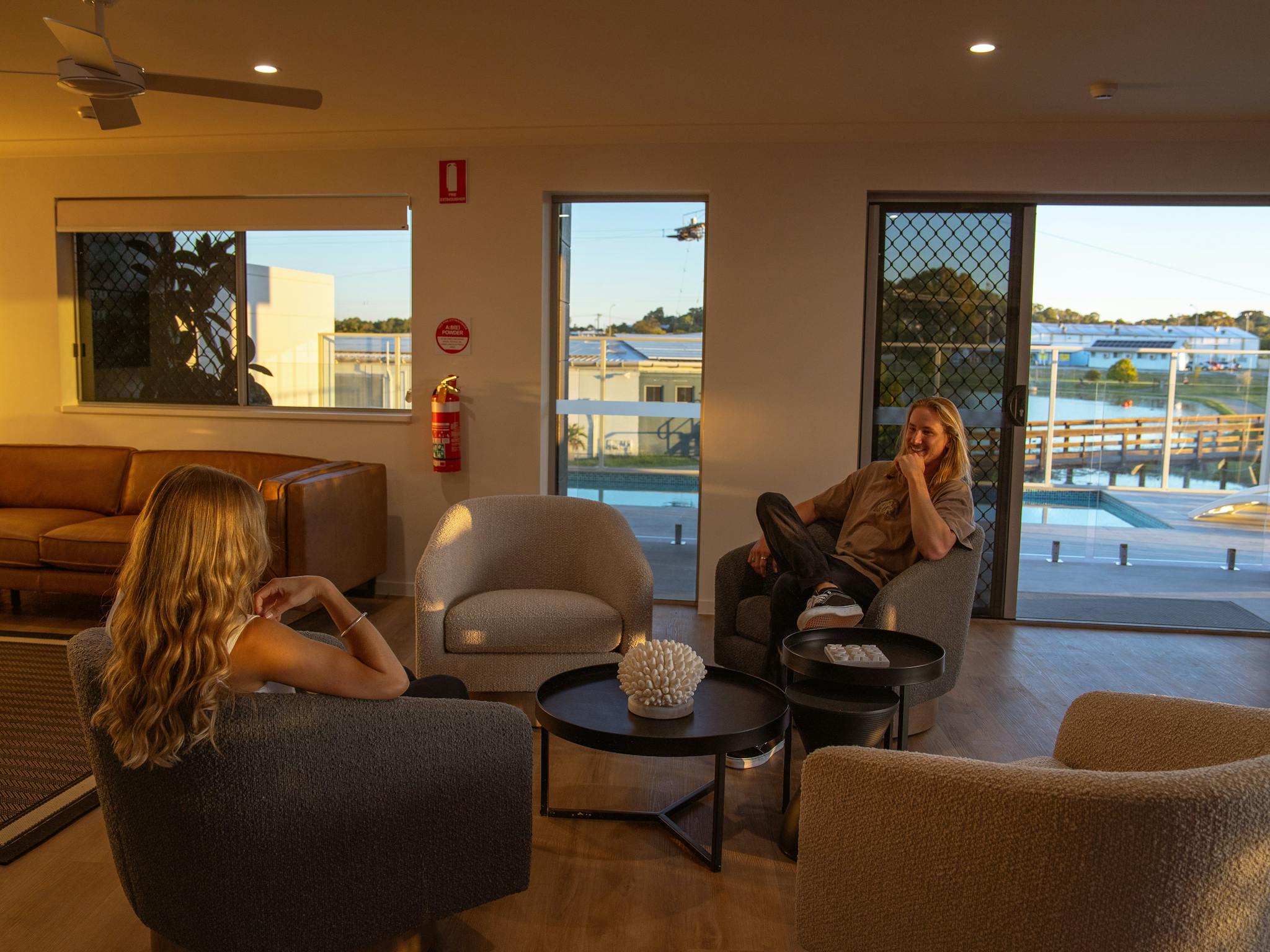 Shared lounge area over looking the pool Mackay Adventure Lodge Shared lounge area over looking the pool Mackay Adventure Lodge