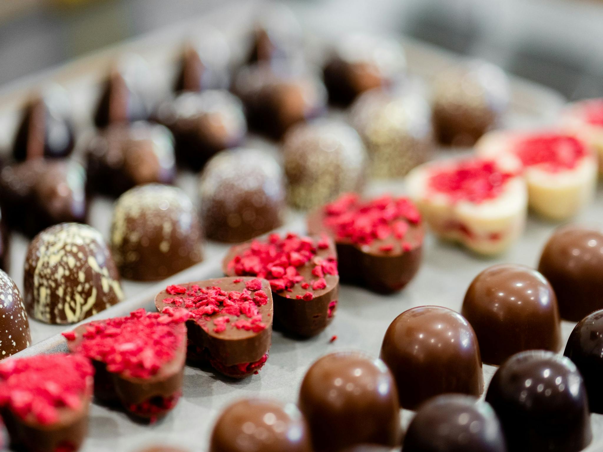 handcrafted individual chocolates in various shapes & decorations