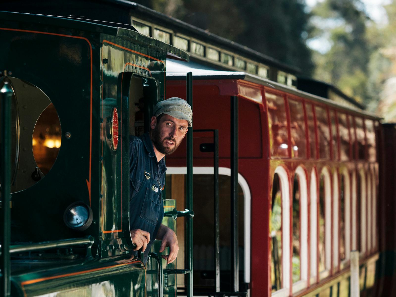An engineer in charge of a locomotive on the West Coast Wilderness Railway