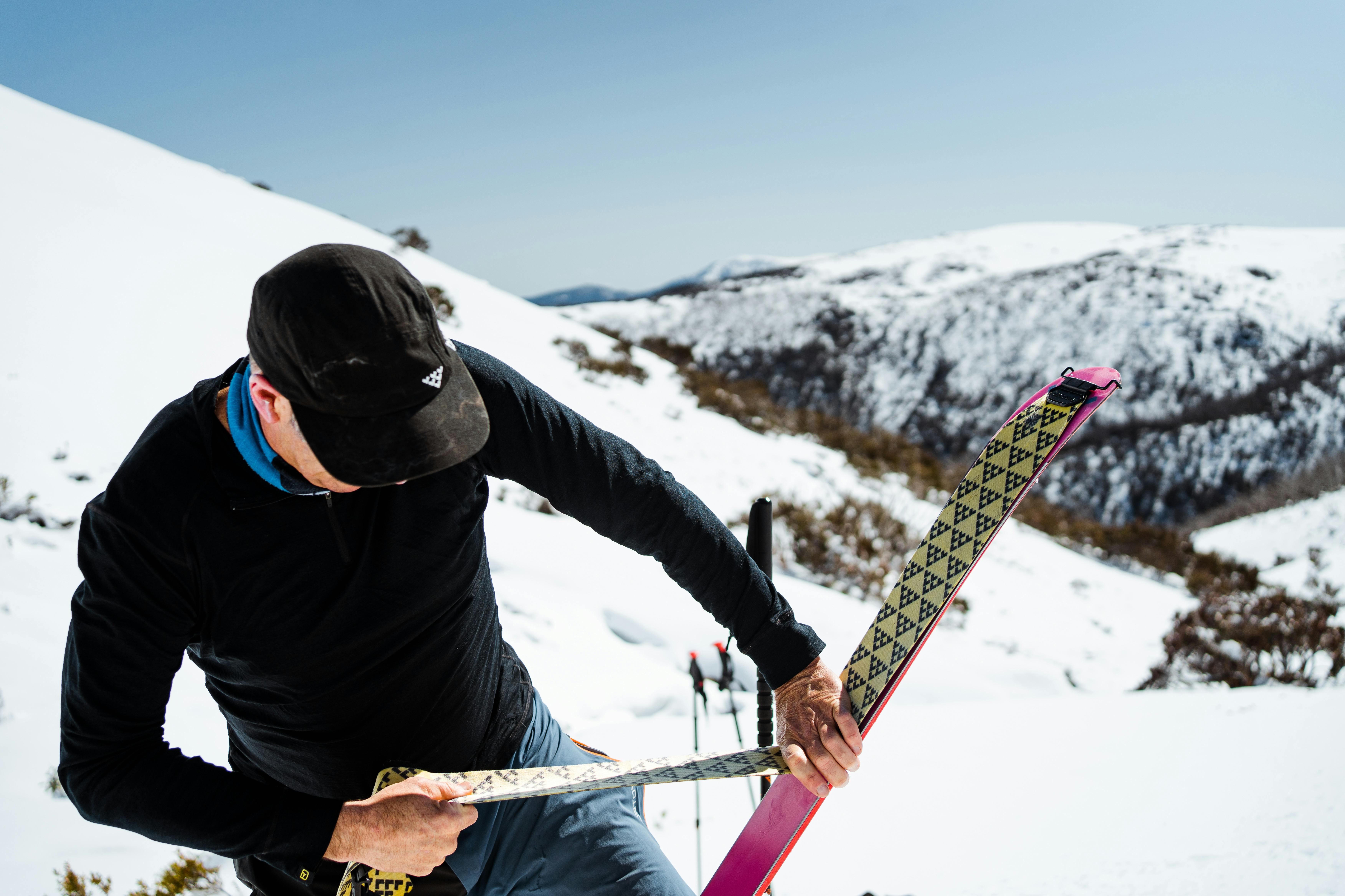 Man with skiiing equipment