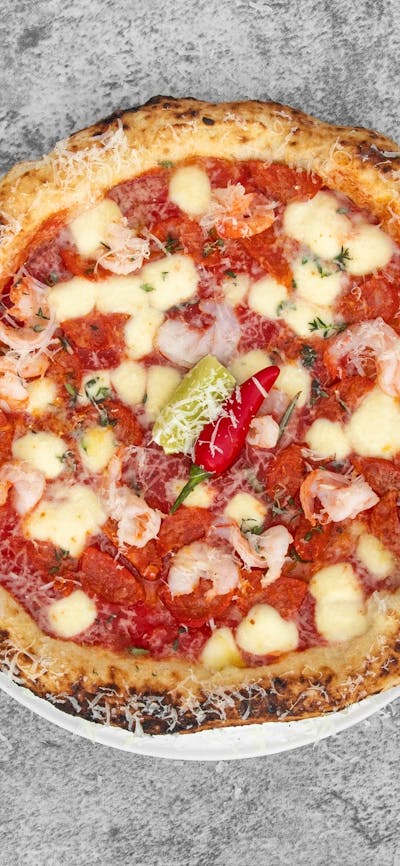 San Marzano Tomatoes, Fior de latte, Garlic King Prawn, Chorizo, Spicy Hot Peppers & Parsley