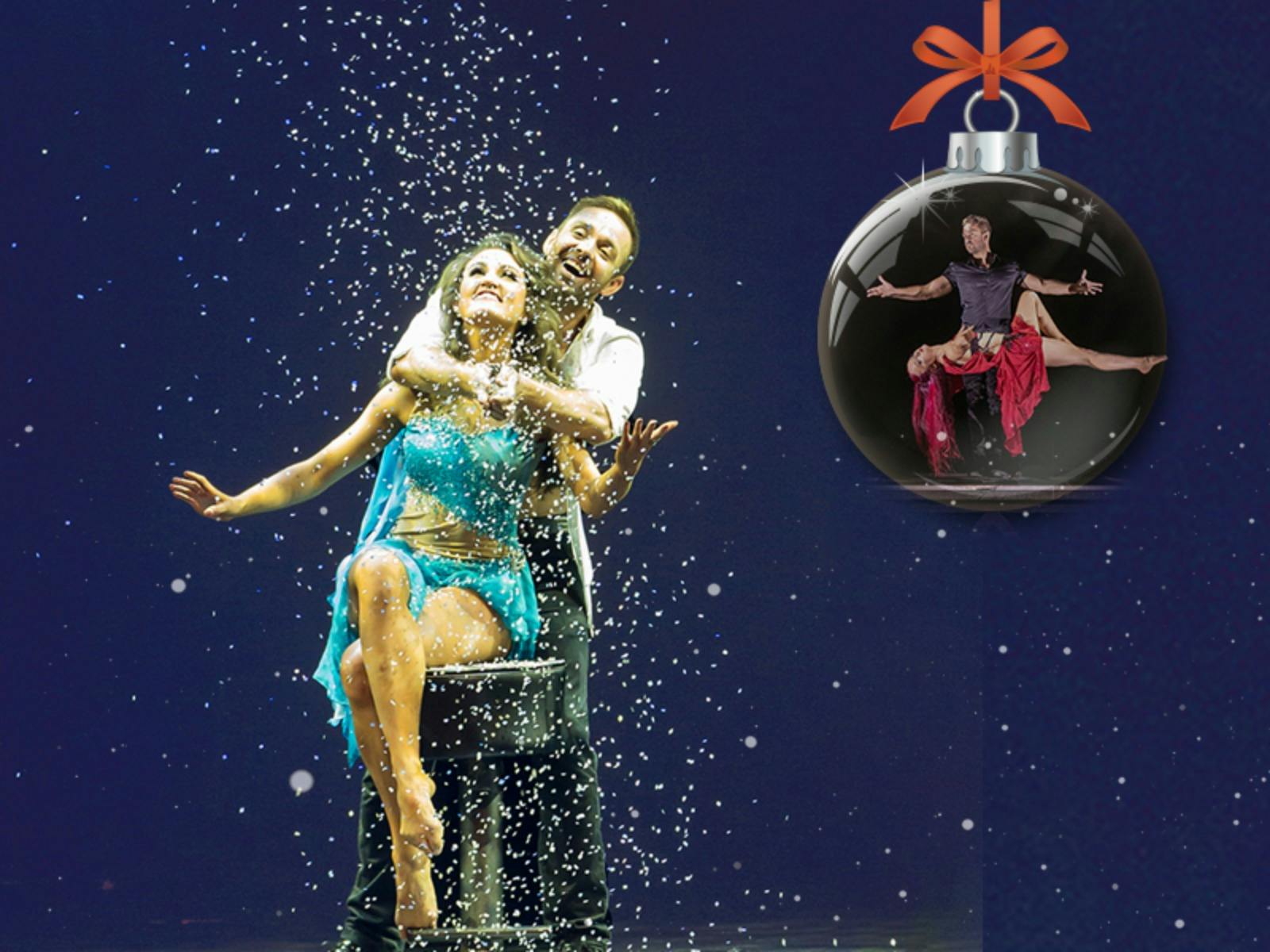 2 people and snow and a bauble