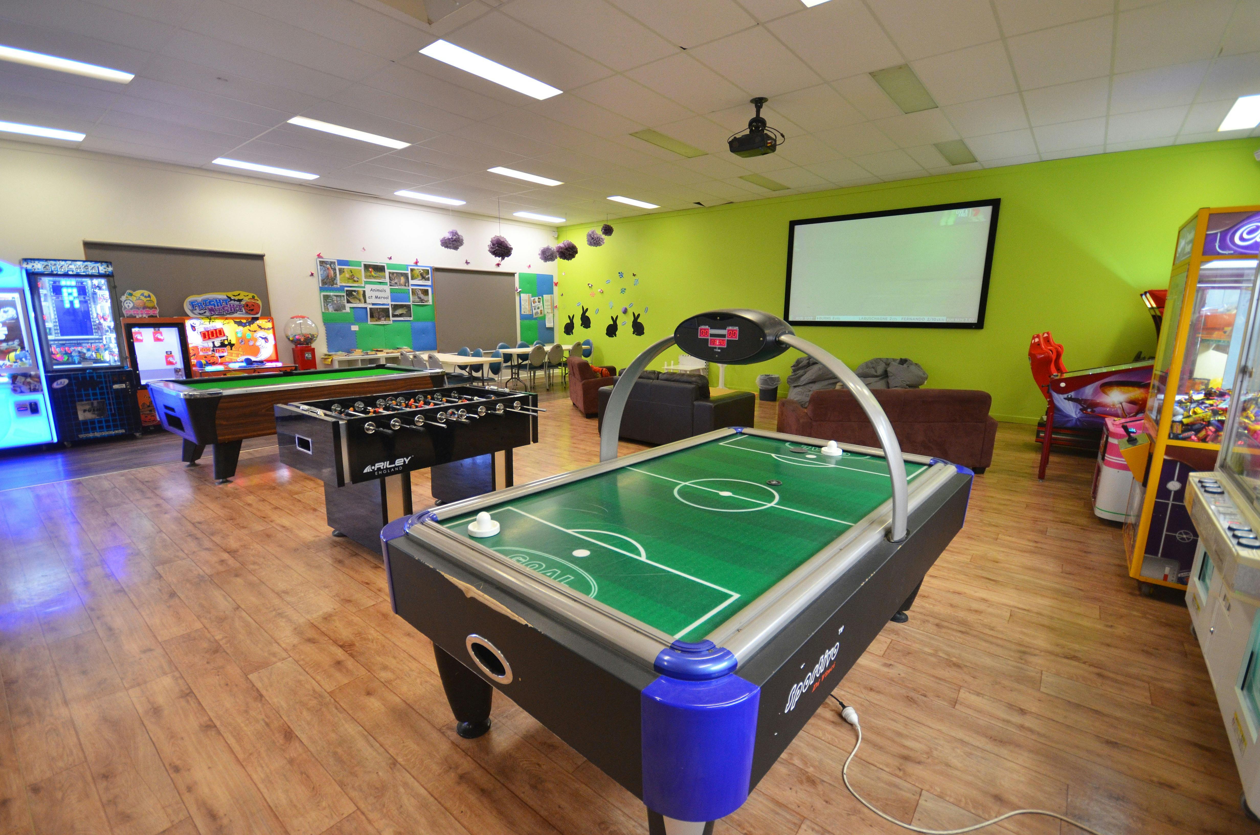 Game Room with fussball and air hockey  tables