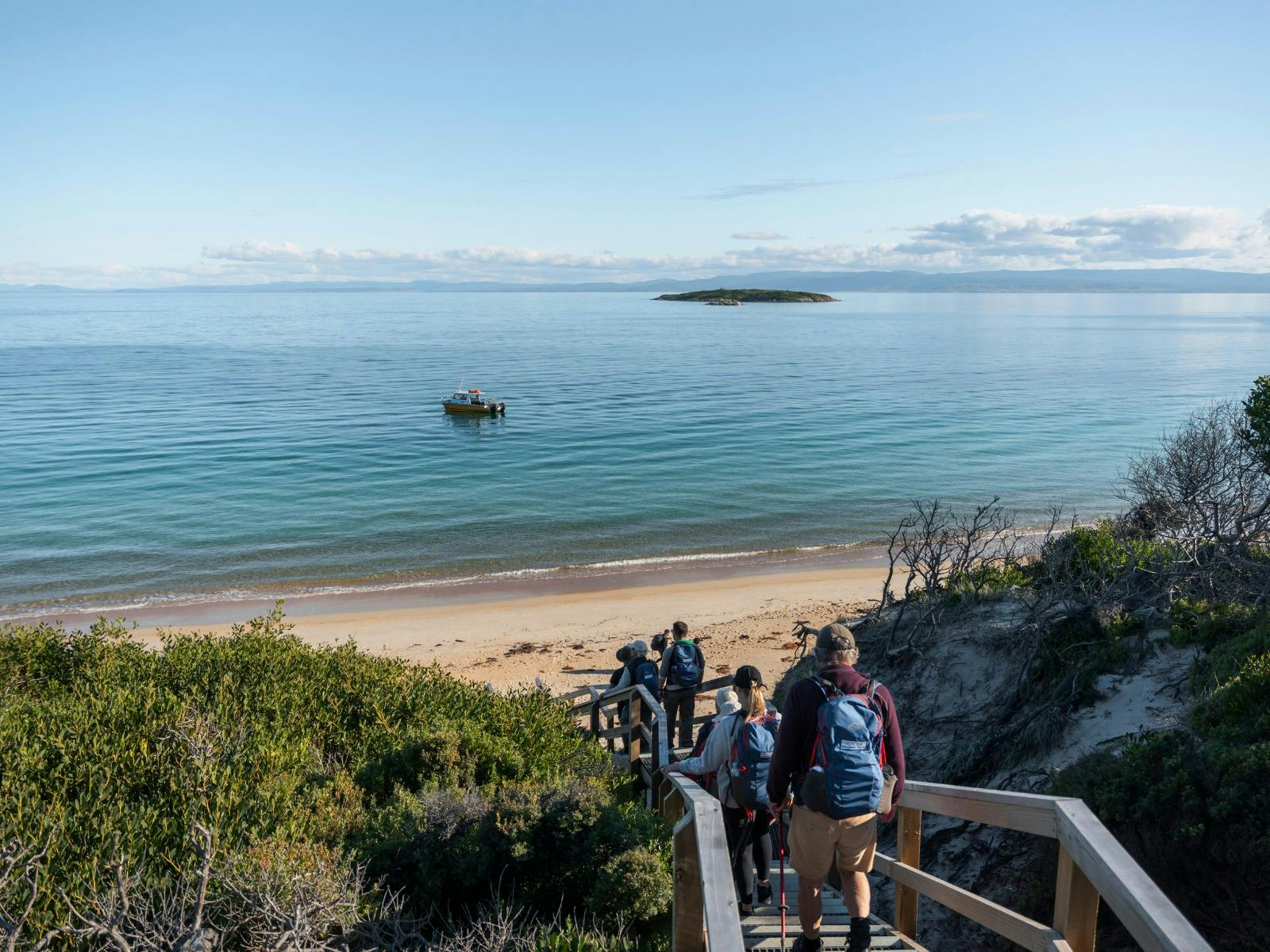 walking down to boat on hazards beach