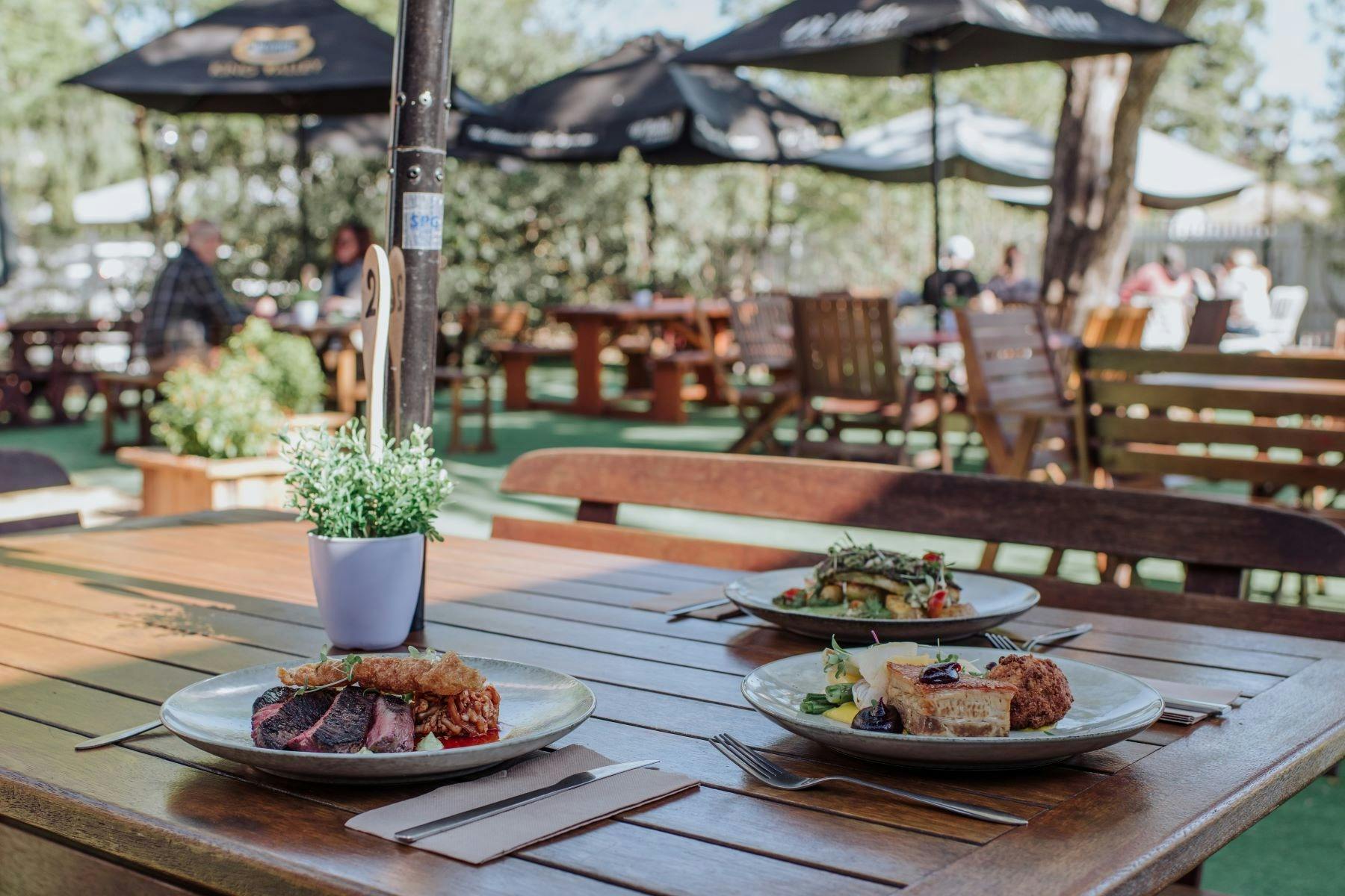 Enjoy a beautiful meal in the attractive outdoor dining area.